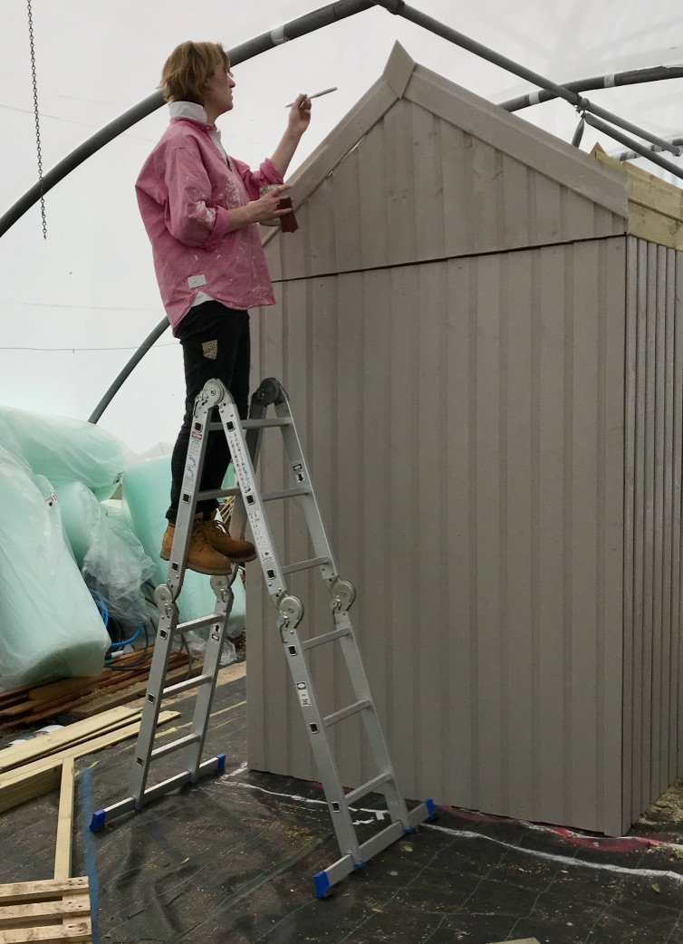 Alex painting the shed for the Sparsholt show garden, for RHS Chelsea Flower Show 2019.